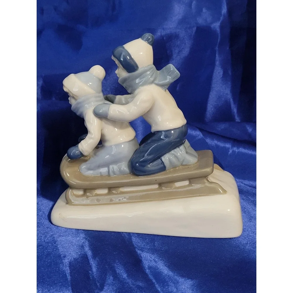 Porcelain Figurine Paul Sebastian Porcelana  Cuernavaca Children on Sled Vintage